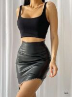 Black imitation leather skirt with decorative chain