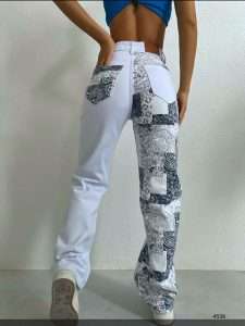 Denim trousers in ethnic pattern